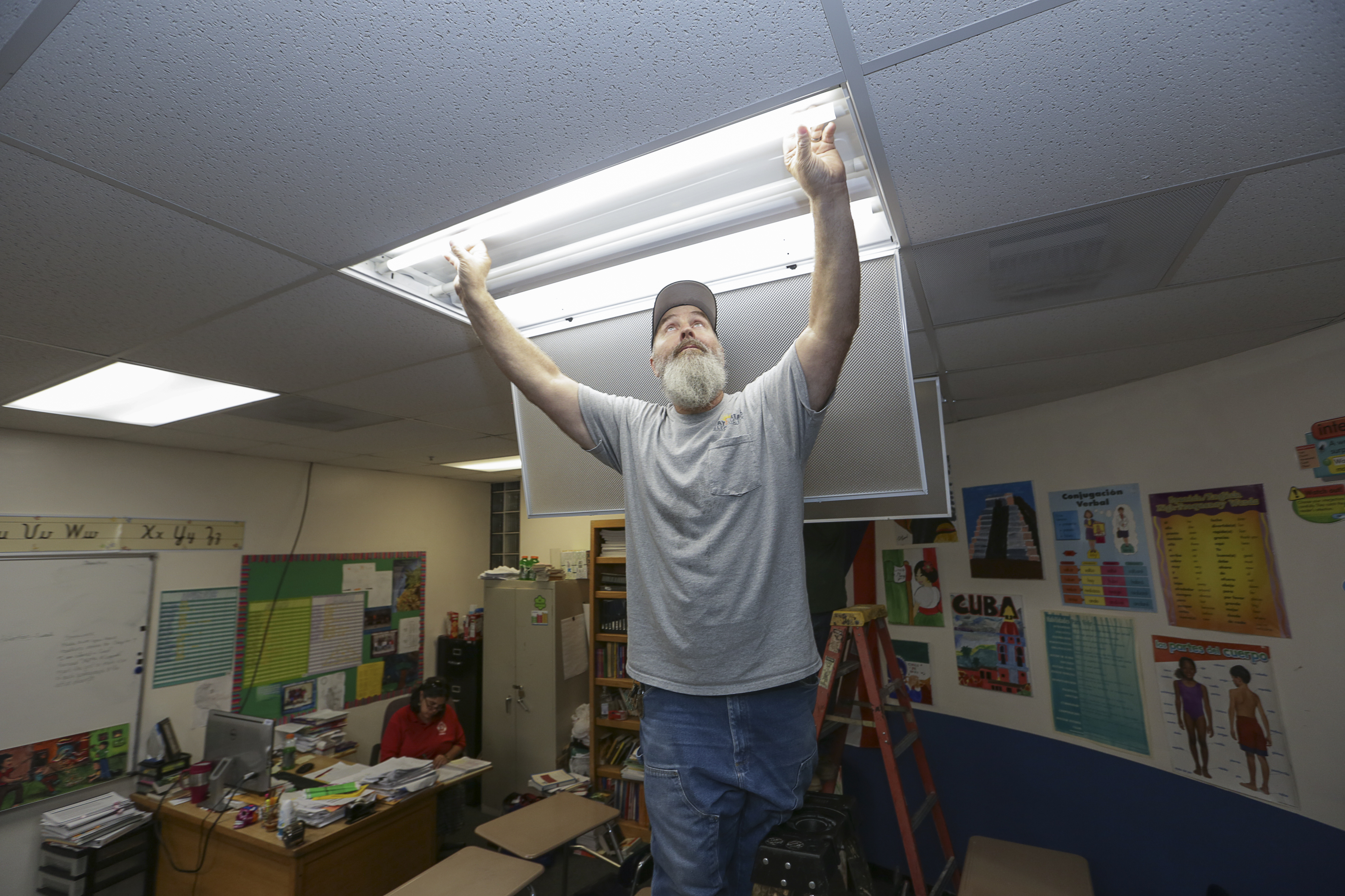 Installing lights in school