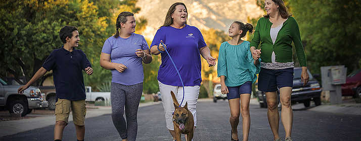 Family walking down the street