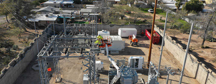 Employees work on new substation