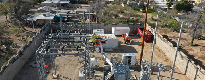 Employees work on new substation